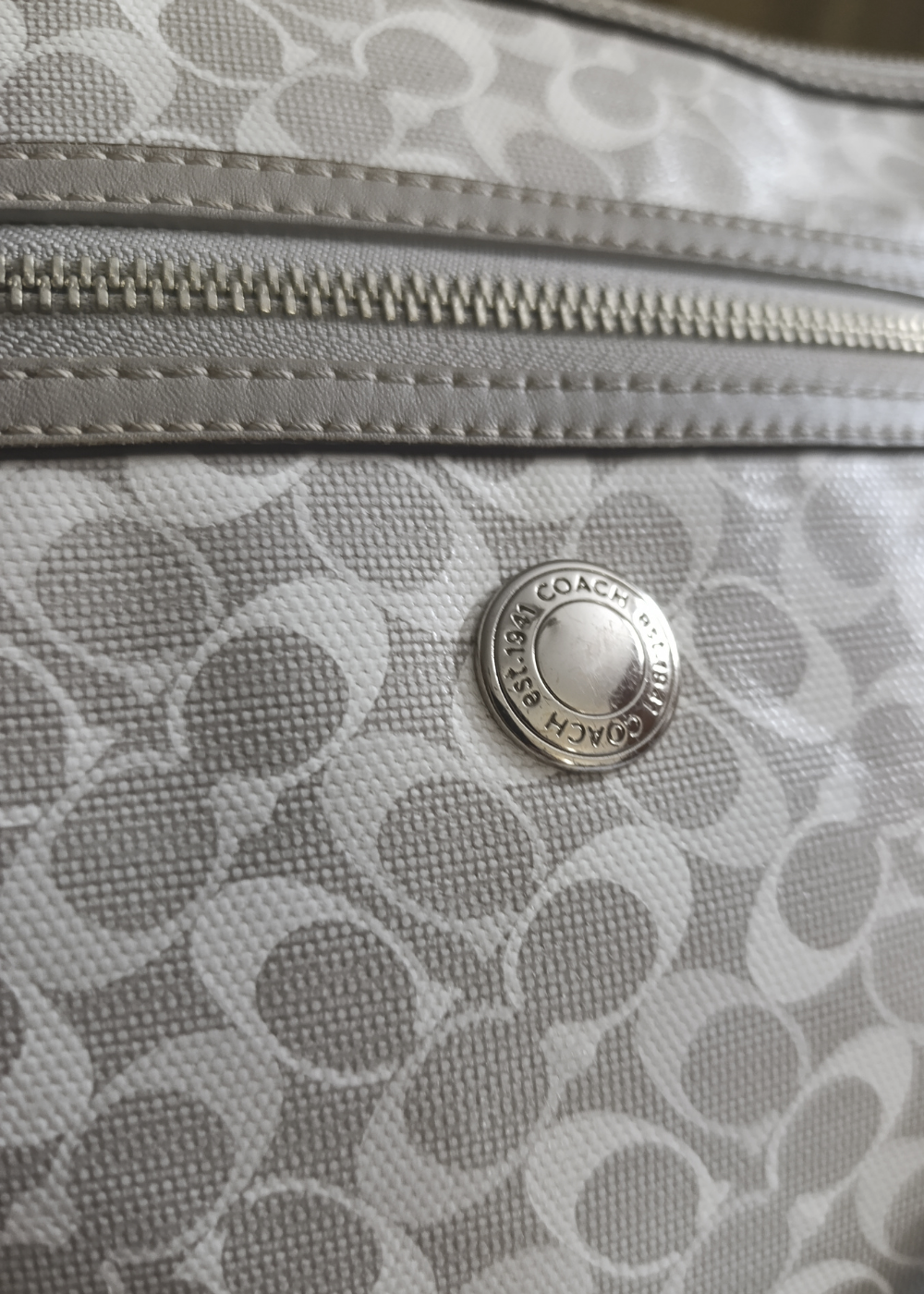 Signature coated Canvas and Leather Cross body Bag