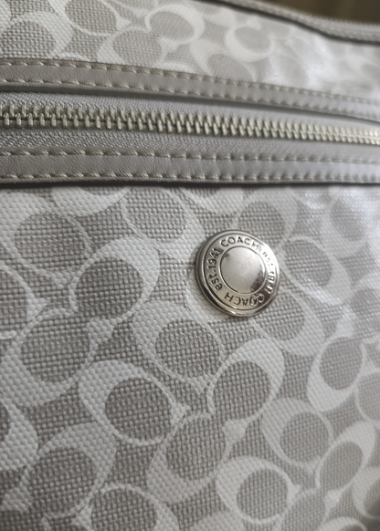 Signature coated Canvas and Leather Cross body Bag